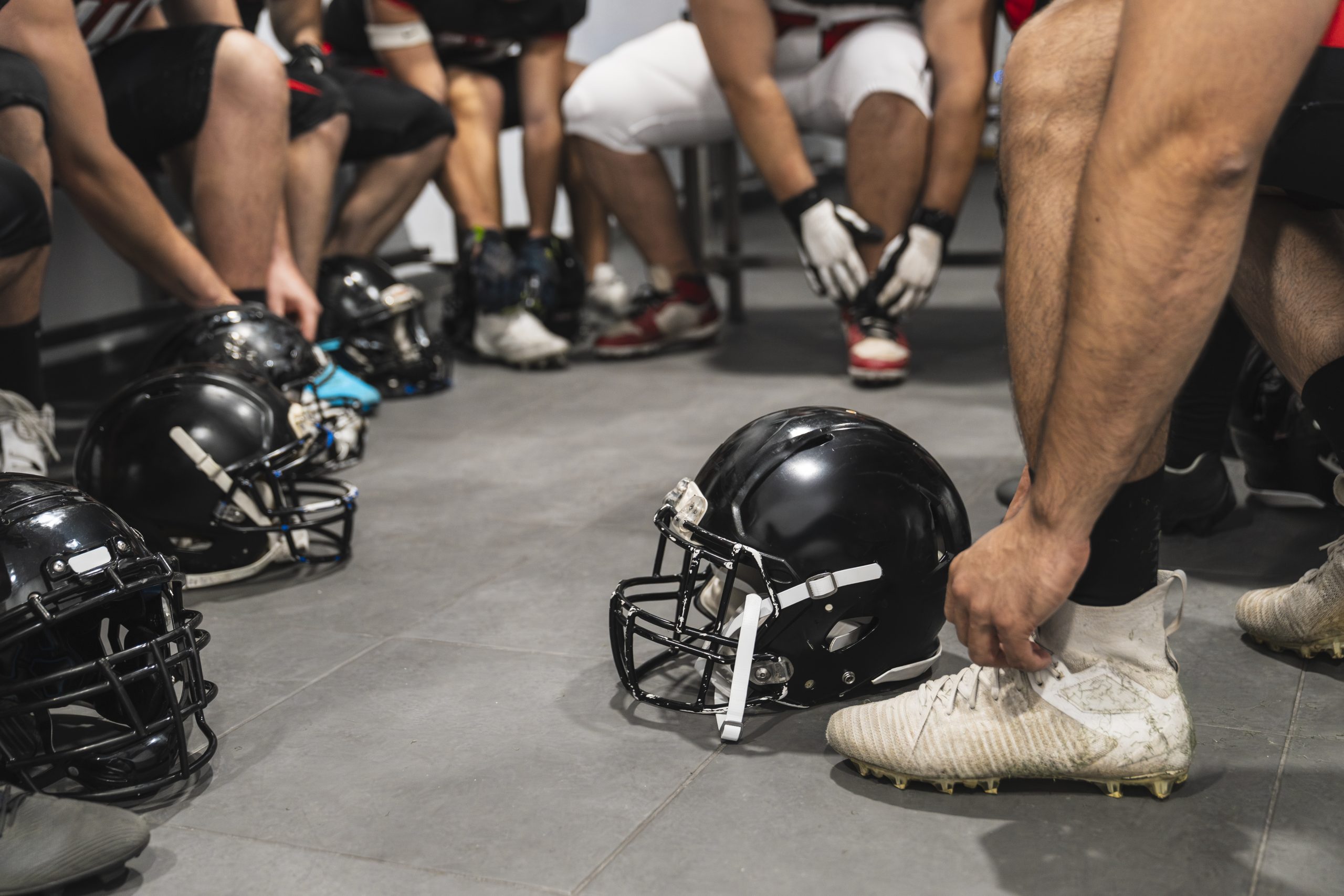Football Team in Locker Room Before the Game